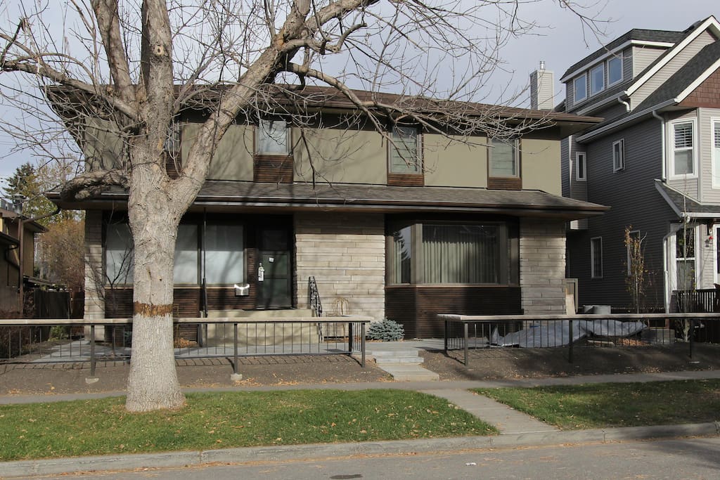 The entry to our house is along the right side (east). Proceed along the side to backdoor for private entry.