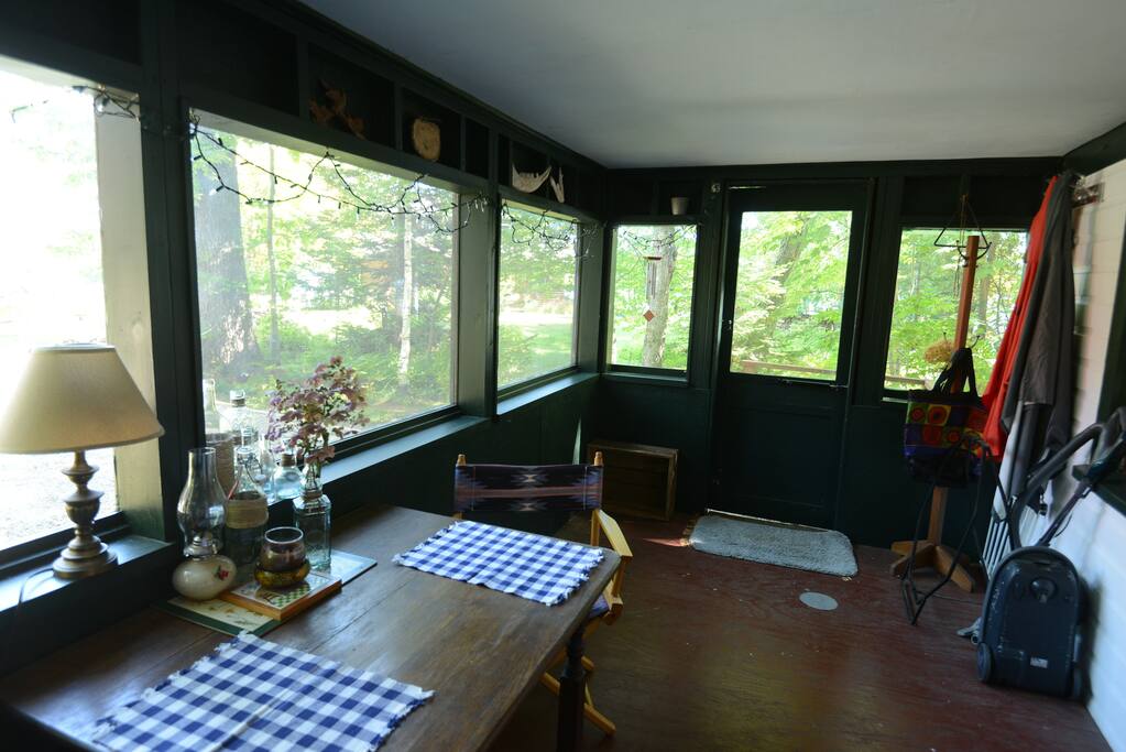 Screened porch that is enclosed in colder weather.