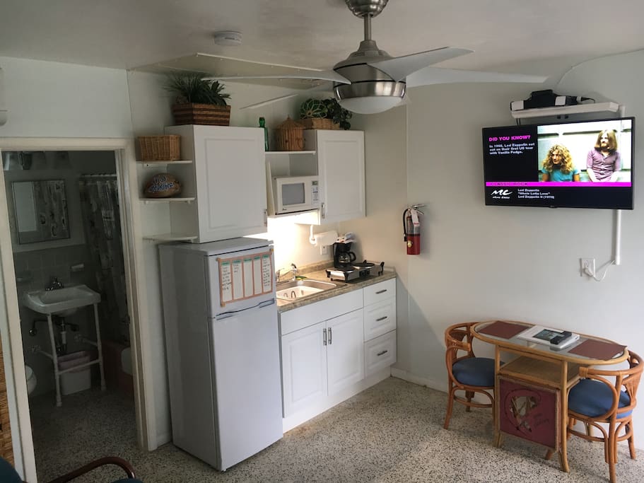 Kitchen has small refridgerator with freezer. Dishes, utensils, pots and pans. In addition you have your own BBQ gas grill outside.