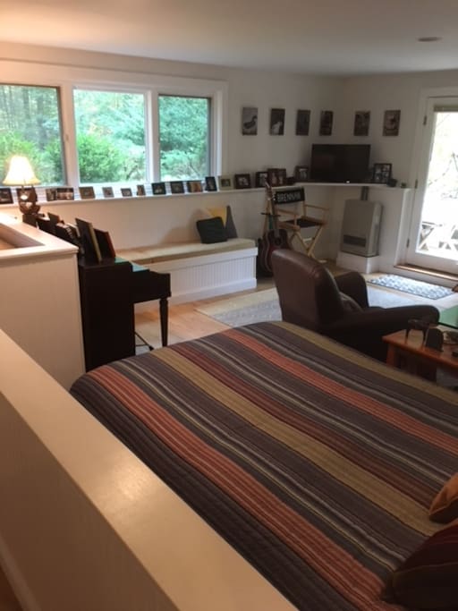 View from kitchen to large bedroom/living area