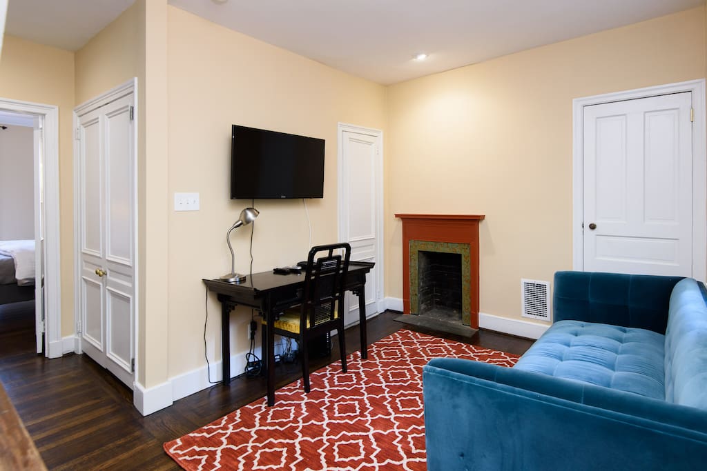 2nd fl sitting room w desk, sofa and 42" flat screen