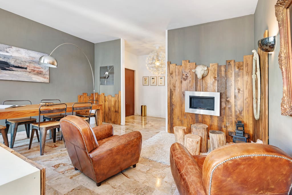 The living room | here: the armchairs, the dining table & the relax area