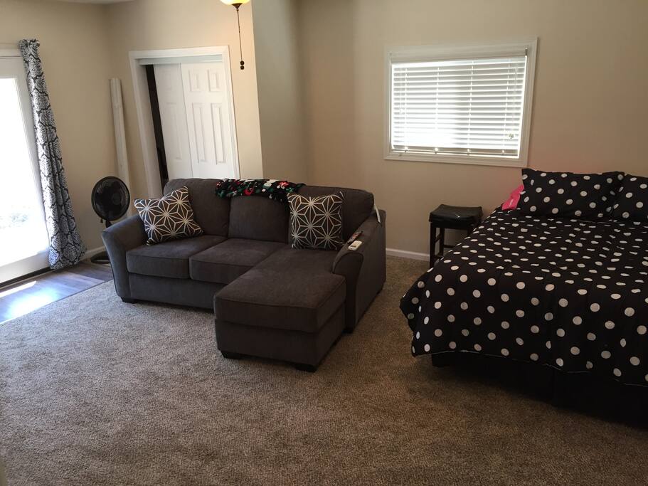 Comfy queen bed and loveseat chaise. We also have a nice cot w/foam pad for a 3rd guest if needed