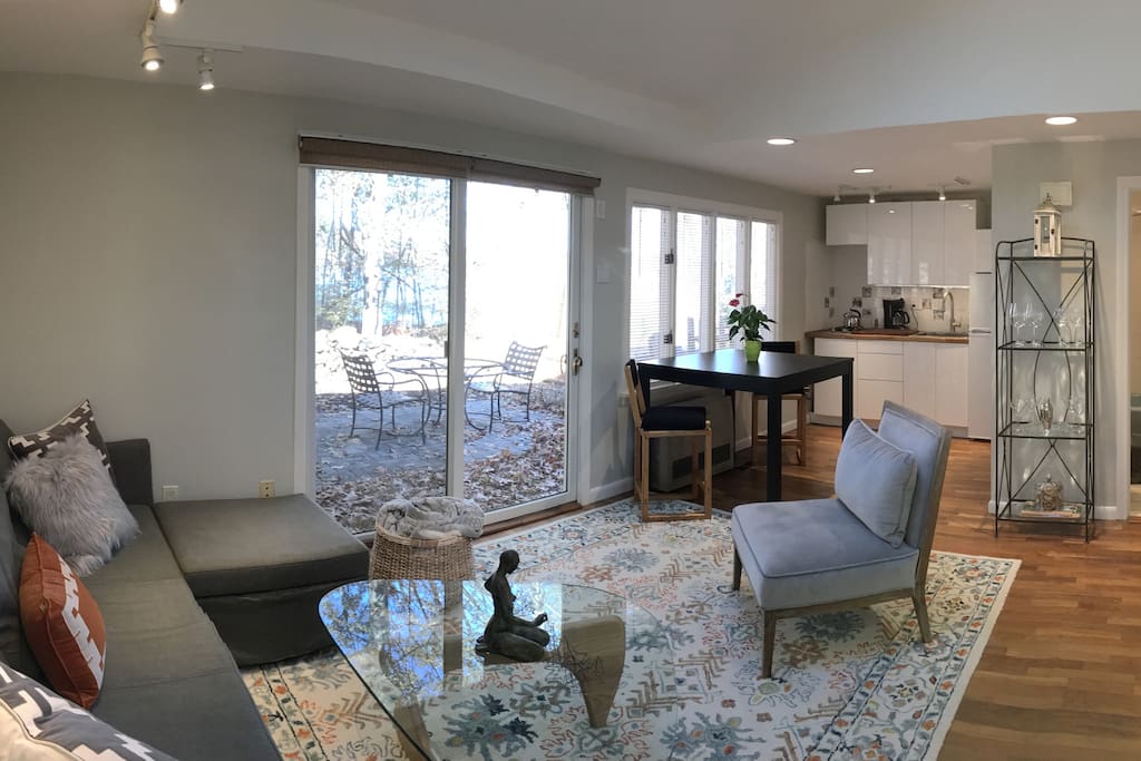 Living room with view of lake and conservation land