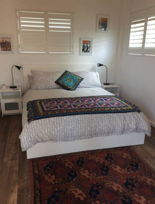 Comfy queen sized bed, overlooking garden.