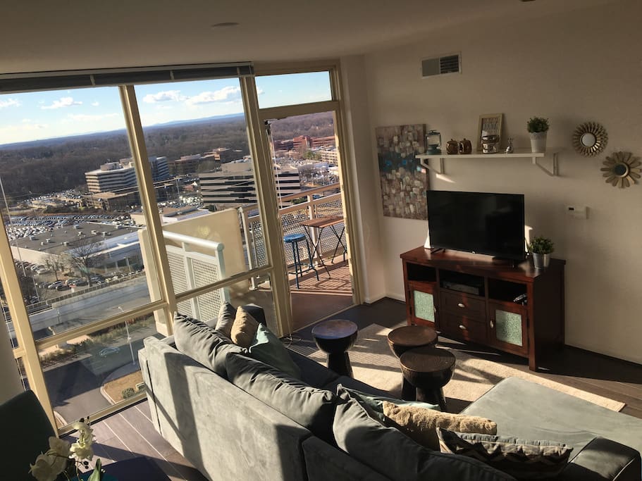 Floor to ceiling windows from a high floor for a beautiful city view. Bright and cheery with sun flooding the apartment for a good portion of the day.