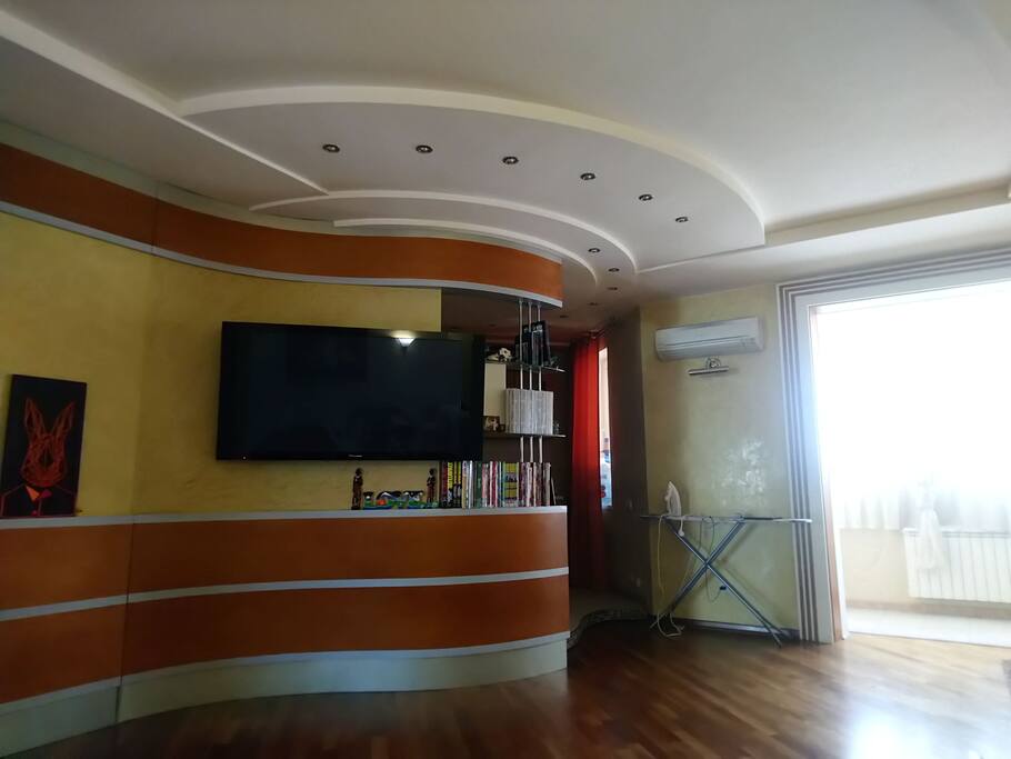 Common room with TV and comics library