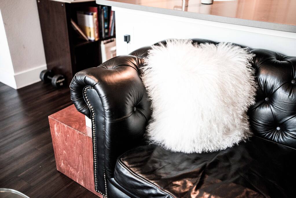 Supple italian leather Chesterfield Sofa. Perfect for unwinding after a hard day of work.