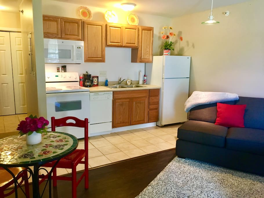 Full kitchen with stove, dishwasher, microwave and full-size refrigerator. Enjoy the coffee or water on us!
