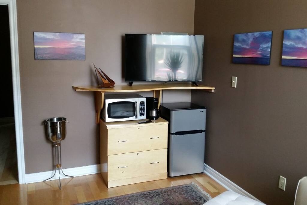 Smart Tv, Fridge with Freezer, Microwave, Coffee Maker