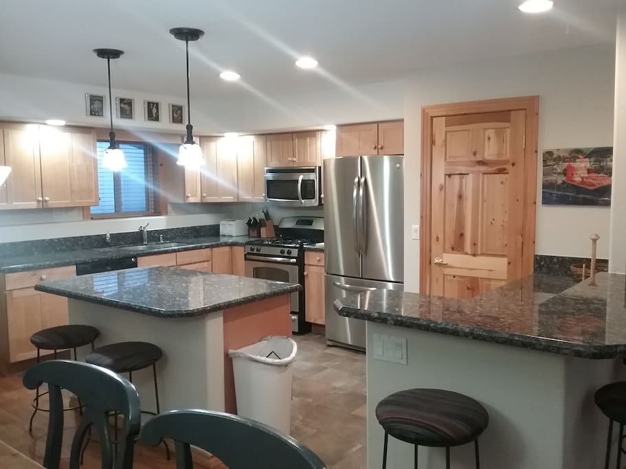 Upgraded stainless steel appliances in remodeled kitchen.