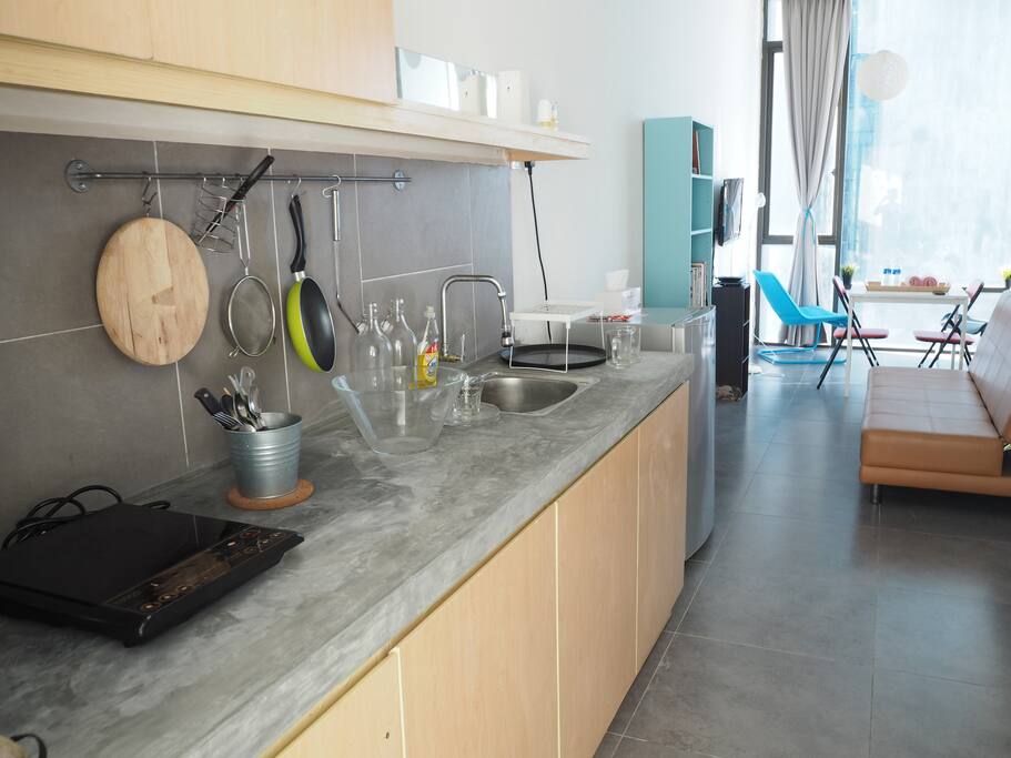 Entering the house, we welcome you with our small pantry, flow of spaces from the living area to an extension to the outdoor view.