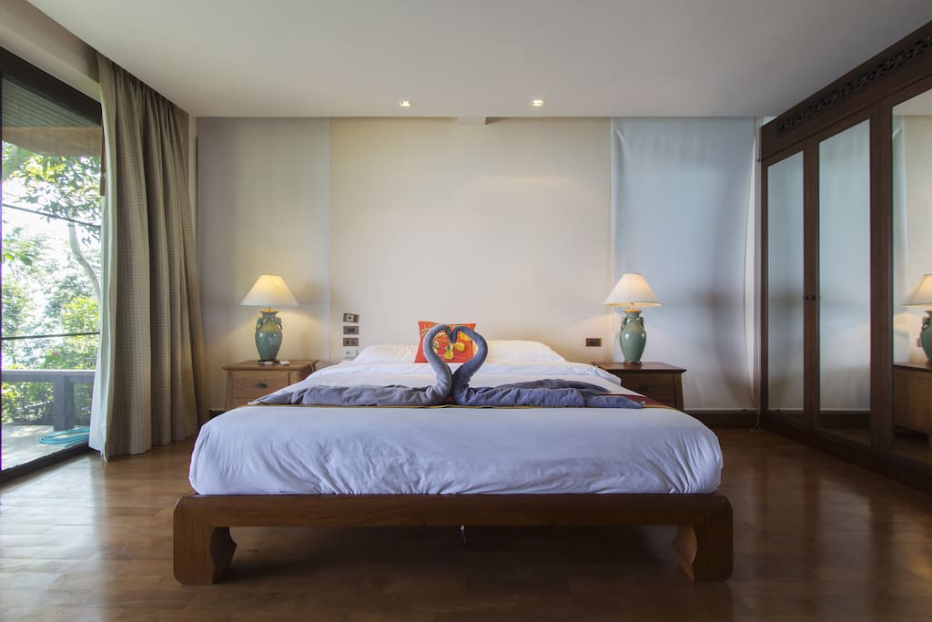 Beautiful bedroom with outstanding sea view on the balcony