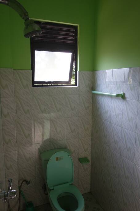 Brand New clean bathrooms. Toilet, Sink, Shower and Mirror.