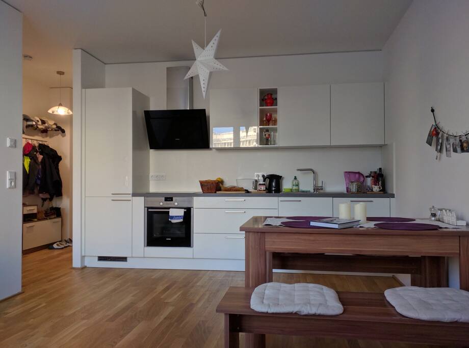 Living room with an equipped kitchen