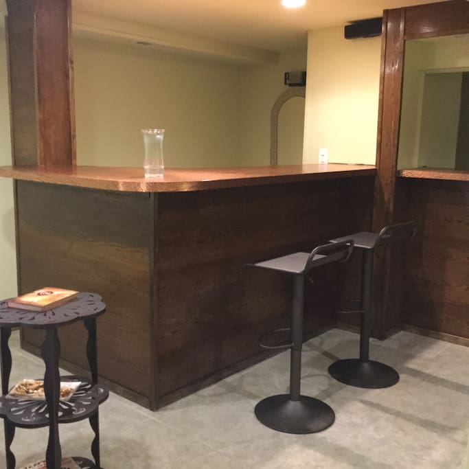 Clean bar with adjustable bar stools for eating and casual sitting