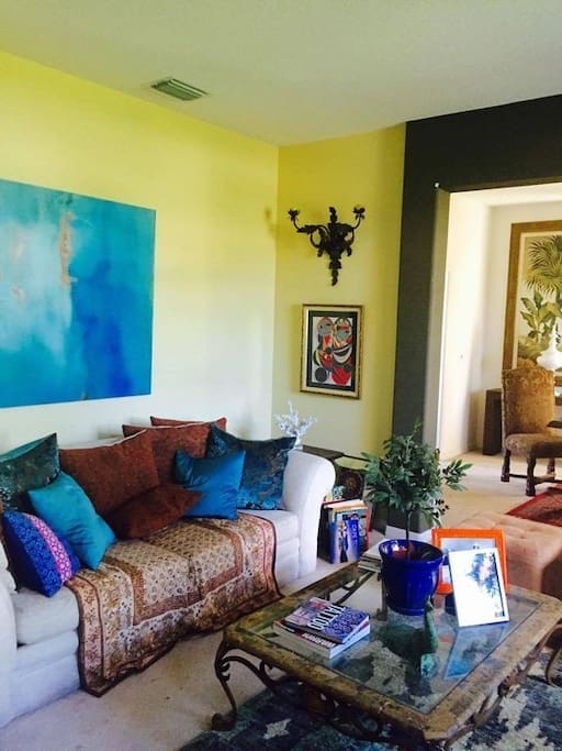 Moroccan and indian accents with a small replica of Picasso, Girl in the mirror piece, one of our family favorites, this is one two living rooms, great for some alone time in a chic setting...