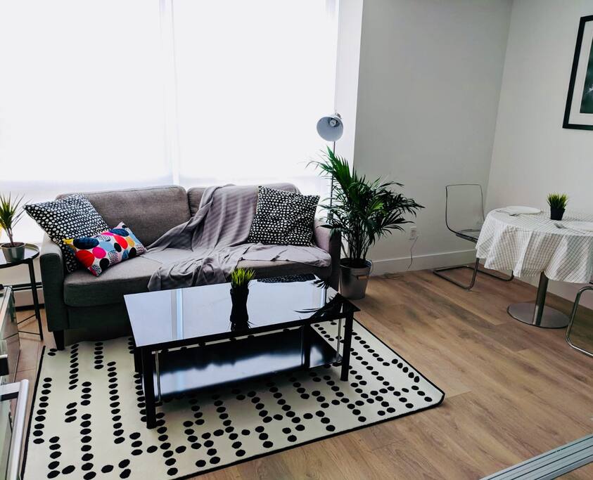 Spacious, chic and modern living space that's tastefully furnished. Bright open concept living area with dine in table for eat in meals should you decide to spend some quiet and relaxing time inside.