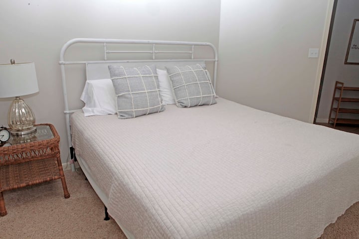 First guests room offers a king sized bed.