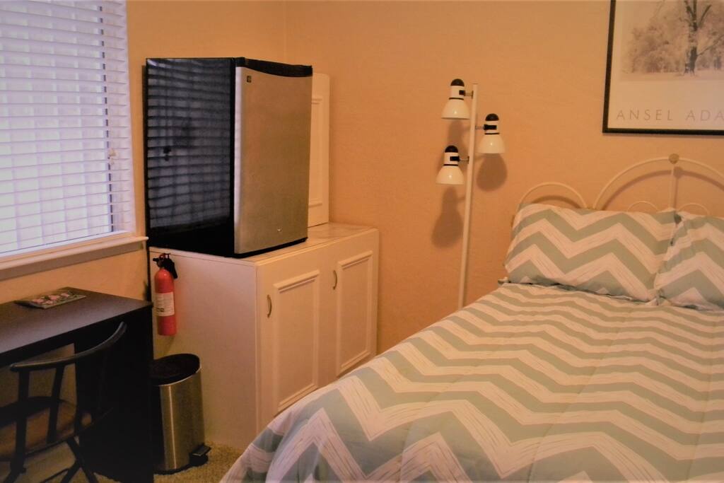 Mini fridge and storage.