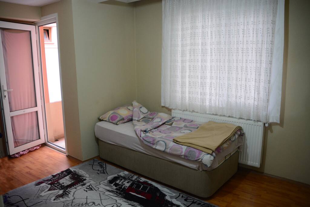 your private room with single bed and balcony