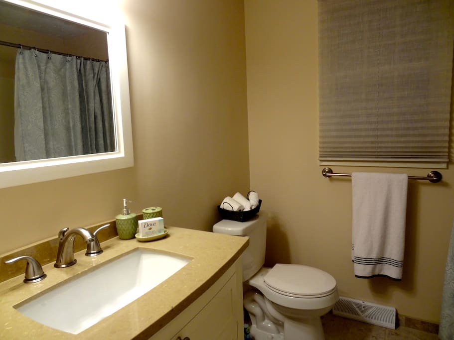 fully furnished bathroom with bathtub