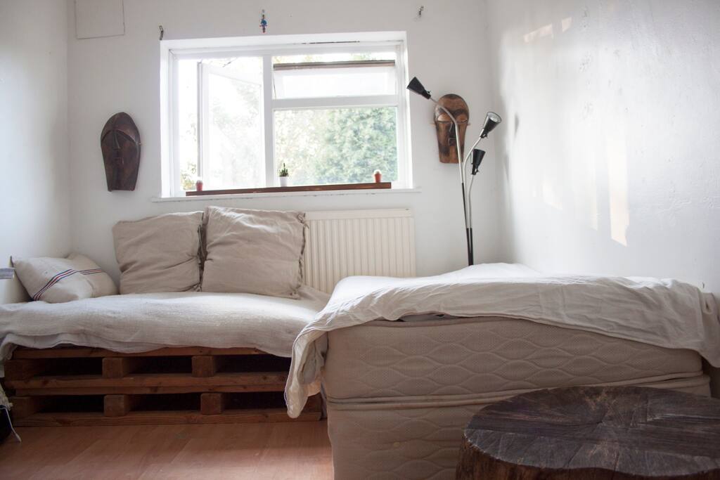 Single bed and sofa for a second guest