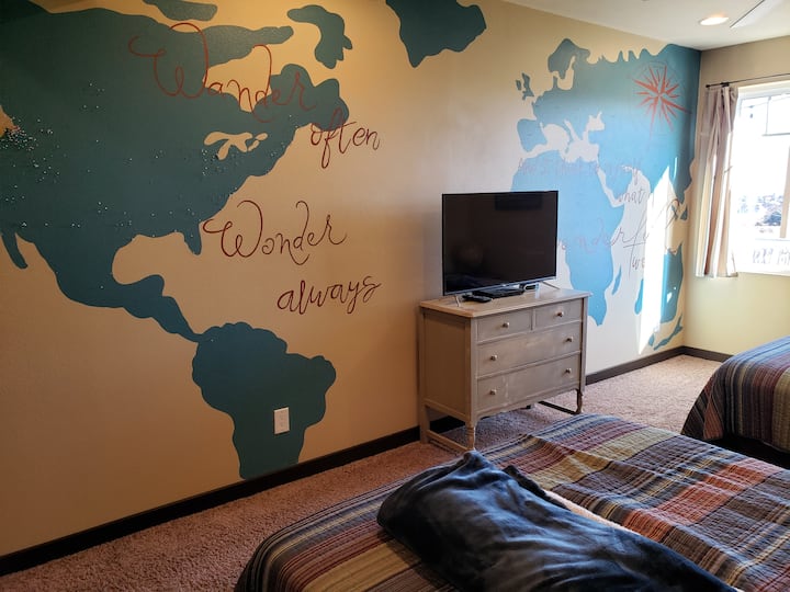 2nd bedroom with two Queen beds Roku TV and Bluray player.