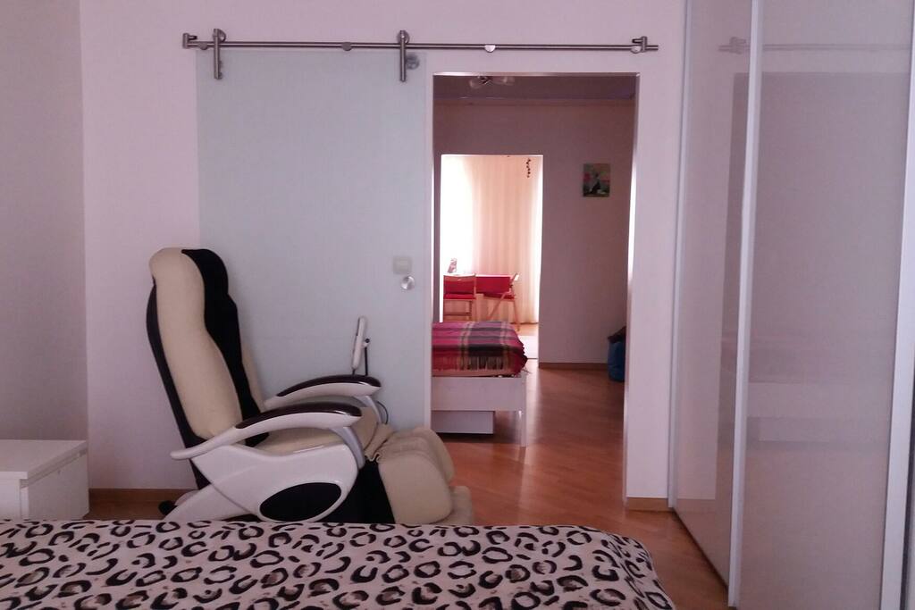 Apartment rooms preview / 2 large double beds and 2 single sofas