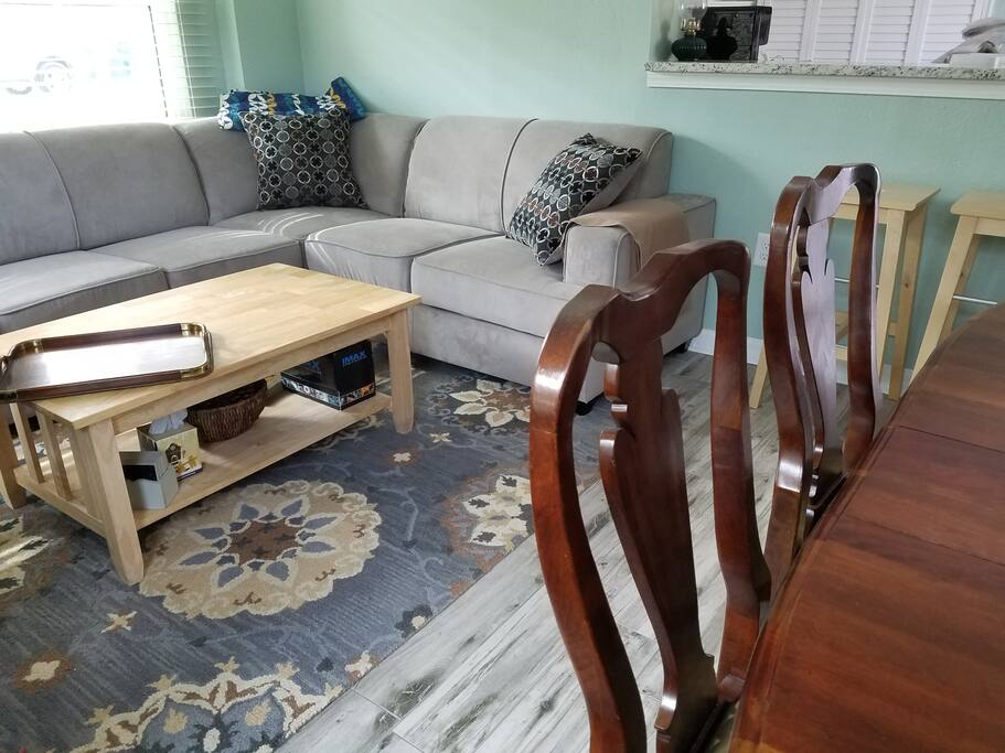 Queen sleeper sofa w/tempurpedic mattress, lift up table top, big basket of games and puzzles.
