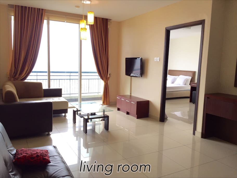 Living room. You may enjoy Tv with local and international channels.