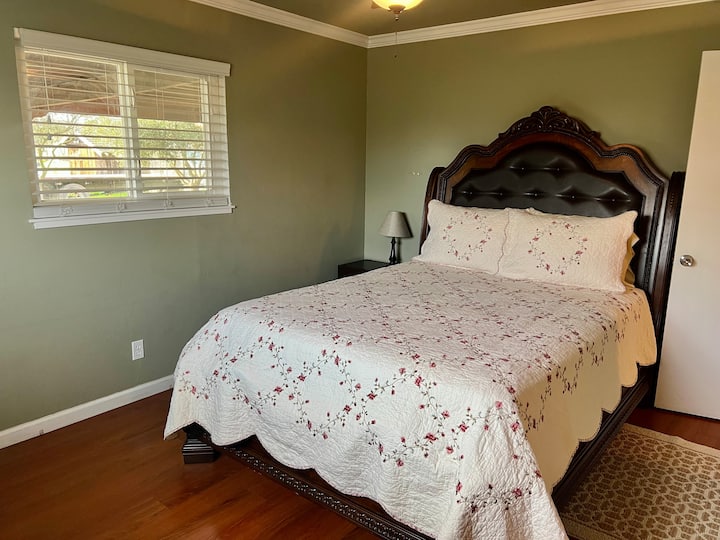 Room #2 back patio views with Olive trees and vineyard. 