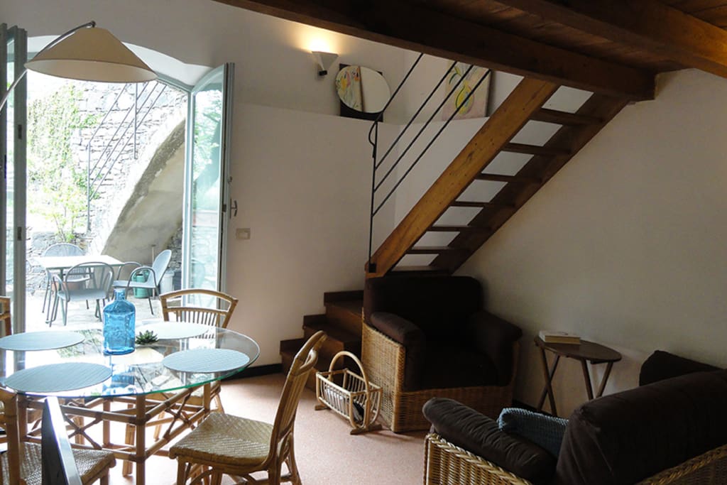 From the inside you may enjoy an open view of the garden. The large door-window is facing to the west, towards the sunset.