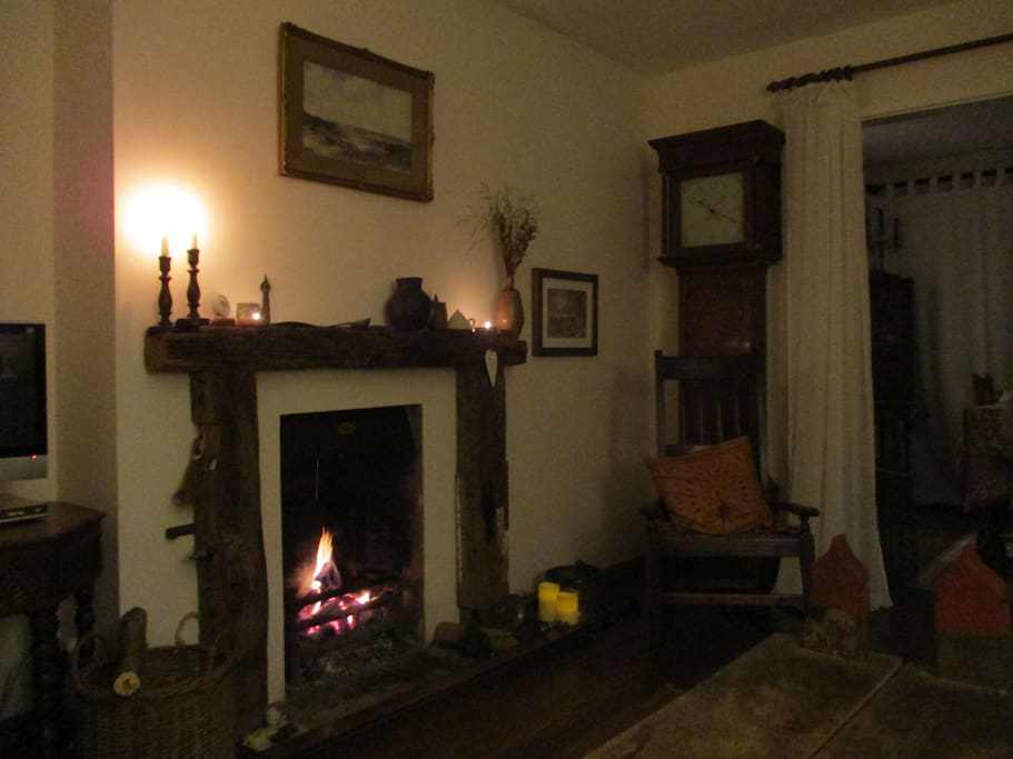 The open fire in the sitting room