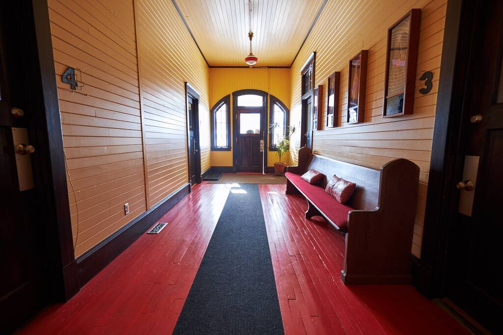 This is the entry to the guest suite. There are offices on one side of the hall (with super nice tenants); the guest suite is on the opposite side of the hall—look for the #3 outside the door. You're home!