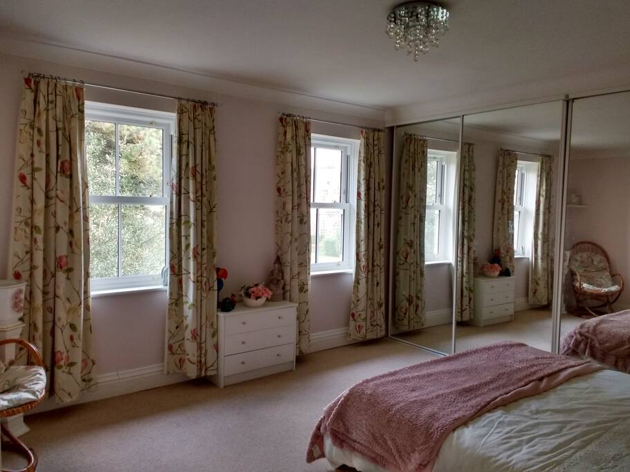 Your room (mirrored wardrobe!)