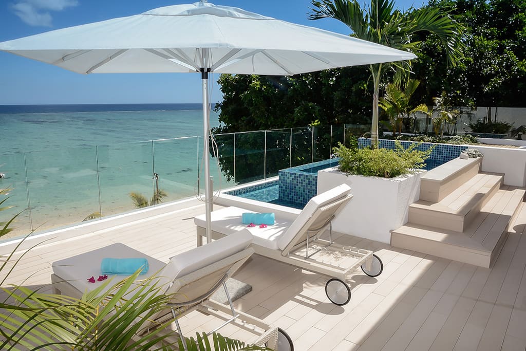 Your private terrace with the view on the sea and your sun loungers