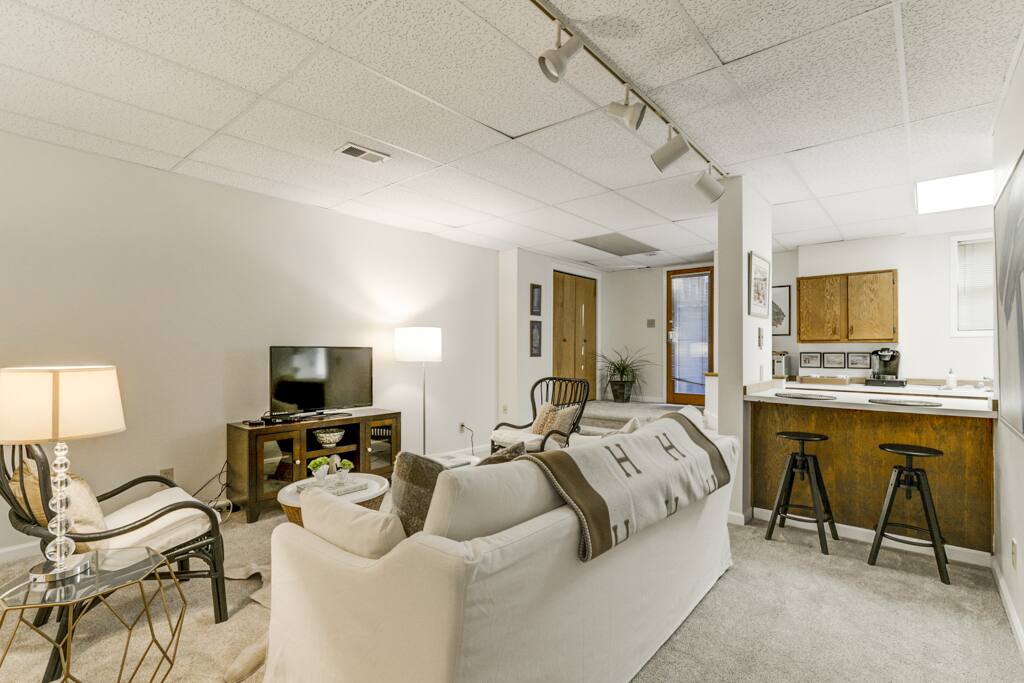 Spacious living space with open concept kitchen.