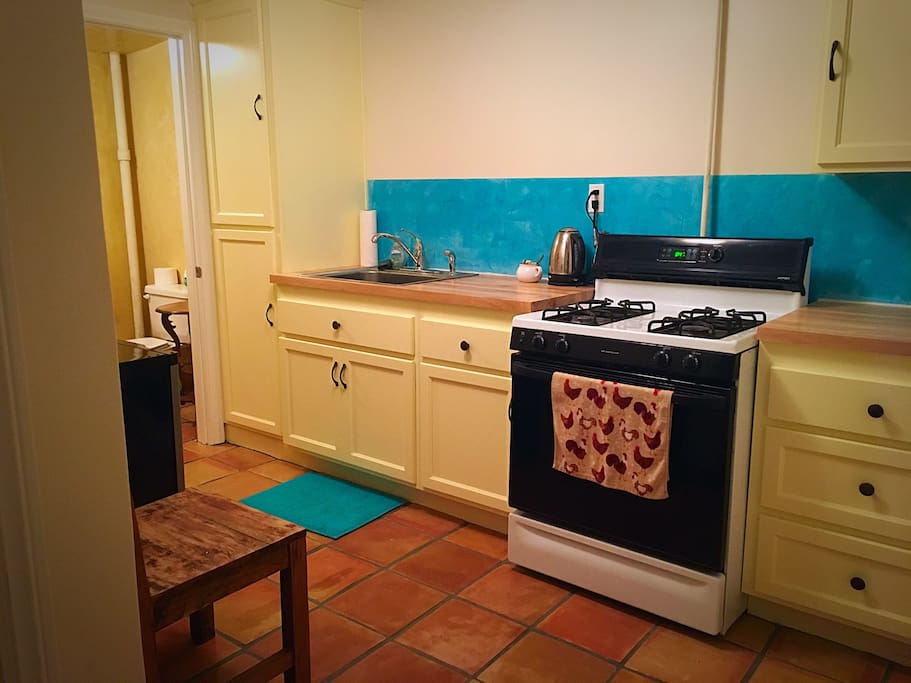 Enjoy your own private kitchen space with stove, fridge and a tea station