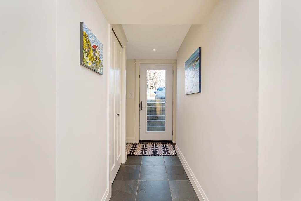 Bright, private entrance with spacious front hall closet