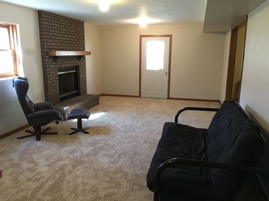 Basement guest living room with private entrance.