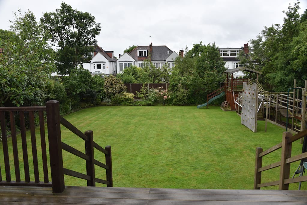 Massive south facing back garden with large deck - great for breakfast on