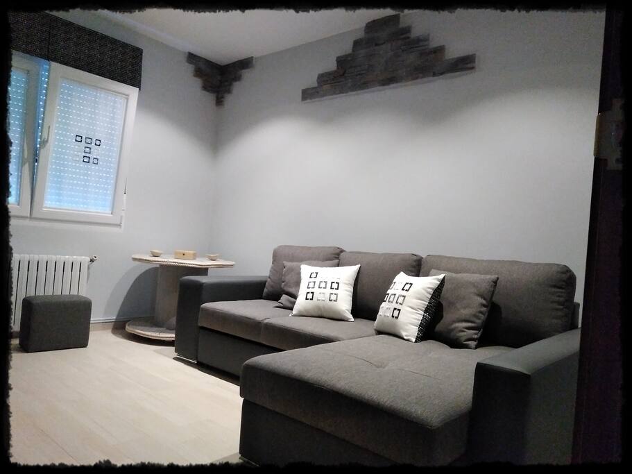 Sala con sofá cama