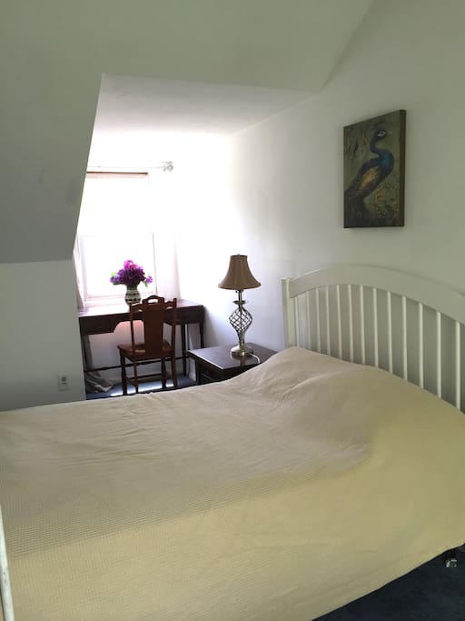 1st double bed, desk and chair.