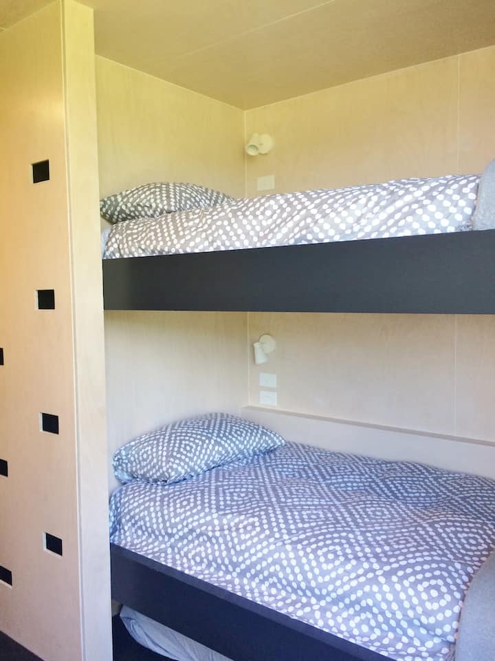The bunk room has 4 beds, each with light & power point so night owls don't disturb others sleeping!