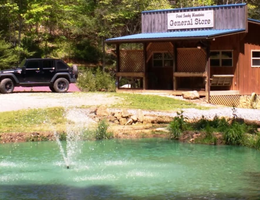 A small pond with fountain (seasonal) welcomes visitors to the General Store!
