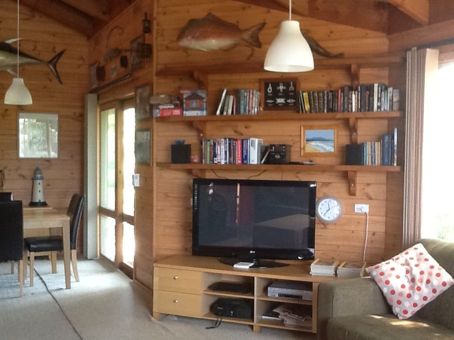 Living/Dining area, Plasma TV, DVD, VCR, iPod dock/stereo, large dining table