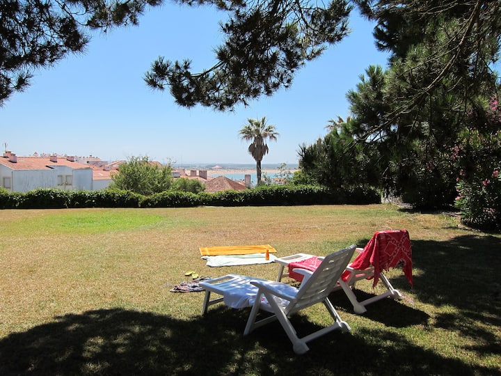 House with garden, beach view
