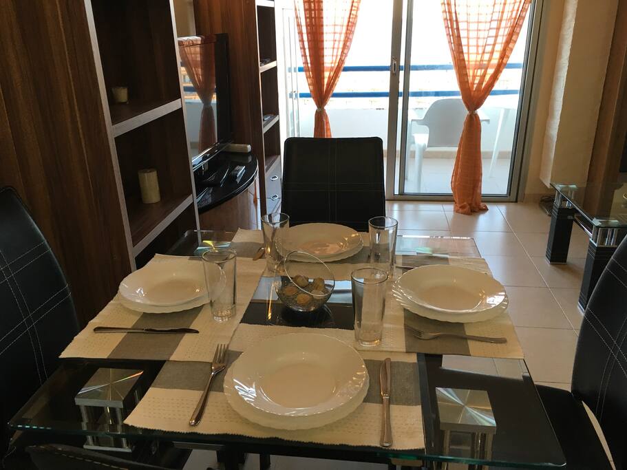 Steel & glass table and four chairs