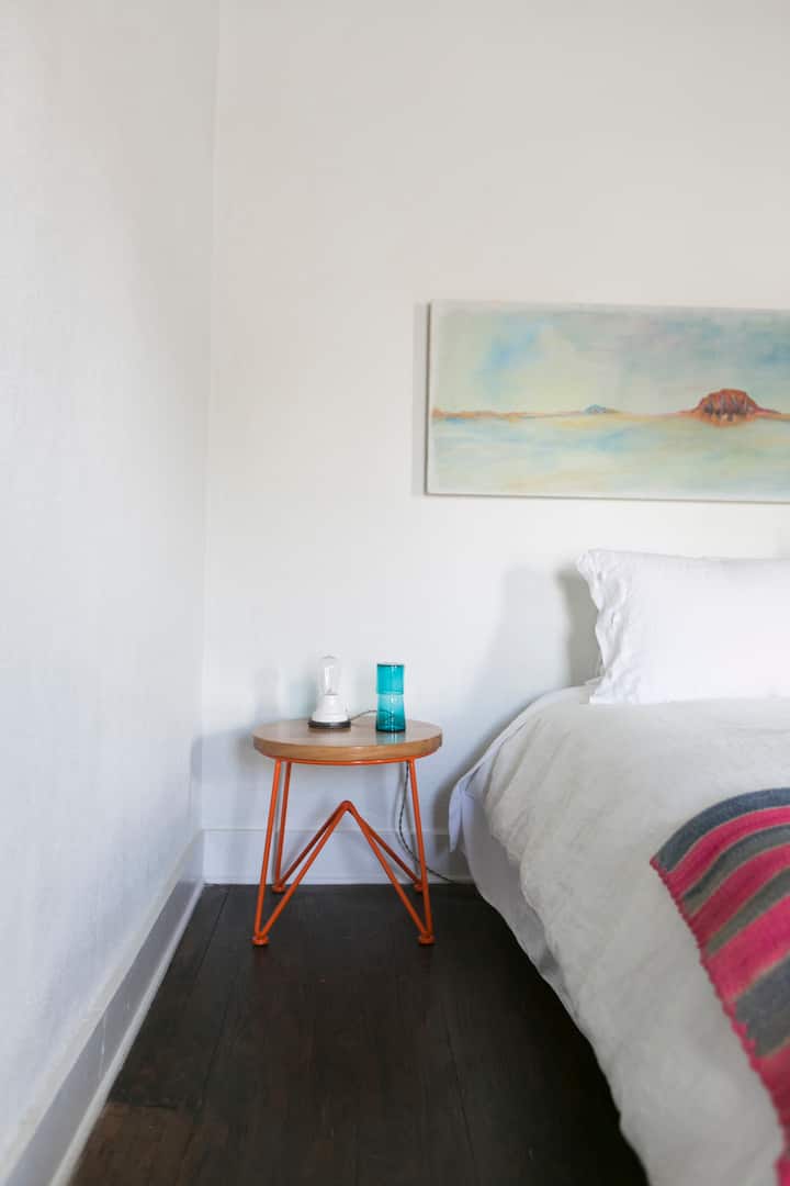 a Garza Furniture side table in the second bedroom
